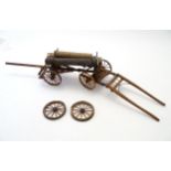 Toys: A 20thC scratch built wooden model of a timber wagon with four wheels. Approx. 31 3/4" long