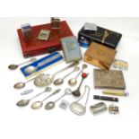 A quantity of assorted miscellaneous items to include a silver plate wine label, souvenir spoons,