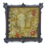 A 19thC needlework embroidery depicting an architectural structure with a border of flowers and