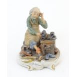 An Italian Capodimonte model of a Ciabattino / Cobbler, titled to base and signed Milio. Marked