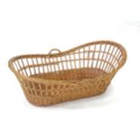 Wicker / cane baby basket. Approx 37" long Please Note - we do not make reference to the condition