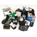 A quantity of assorted film and digital cameras and accessories to include Olympus AF-1, Polaroid