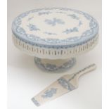 A ceramic cake stand and slice with blue and white decoration (2) Please Note - we do not make
