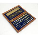 A cased draughtsman set Please Note - we do not make reference to the condition of lots within