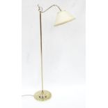 A late 20thC brass standard lamp with white shade, approx 55" high Please Note - we do not make