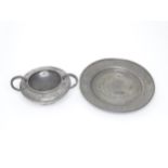 Two items of Arts & Crafts style pewter wares with hammered decoration to include a twin handled