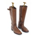 A pair of ladies brown leather knee high boots, approx size 40 Please Note - we do not make