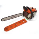 A Stihl D45AV petrol chainsaw, with blade guard, approx 37 1/2" long Please Note - we do not make