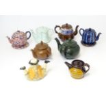 A quantity of assorted teapots etc. to include examples by Tony Wood Staffordshire, 'Booths' Silicon