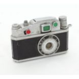 A novelty lighter formed as a camera. Approx. 2 1/2" wide Please Note - we do not make reference