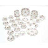 A quantity of Royal Albert tea wares in the Petit Point pattern to include teapot, cups, saucers,