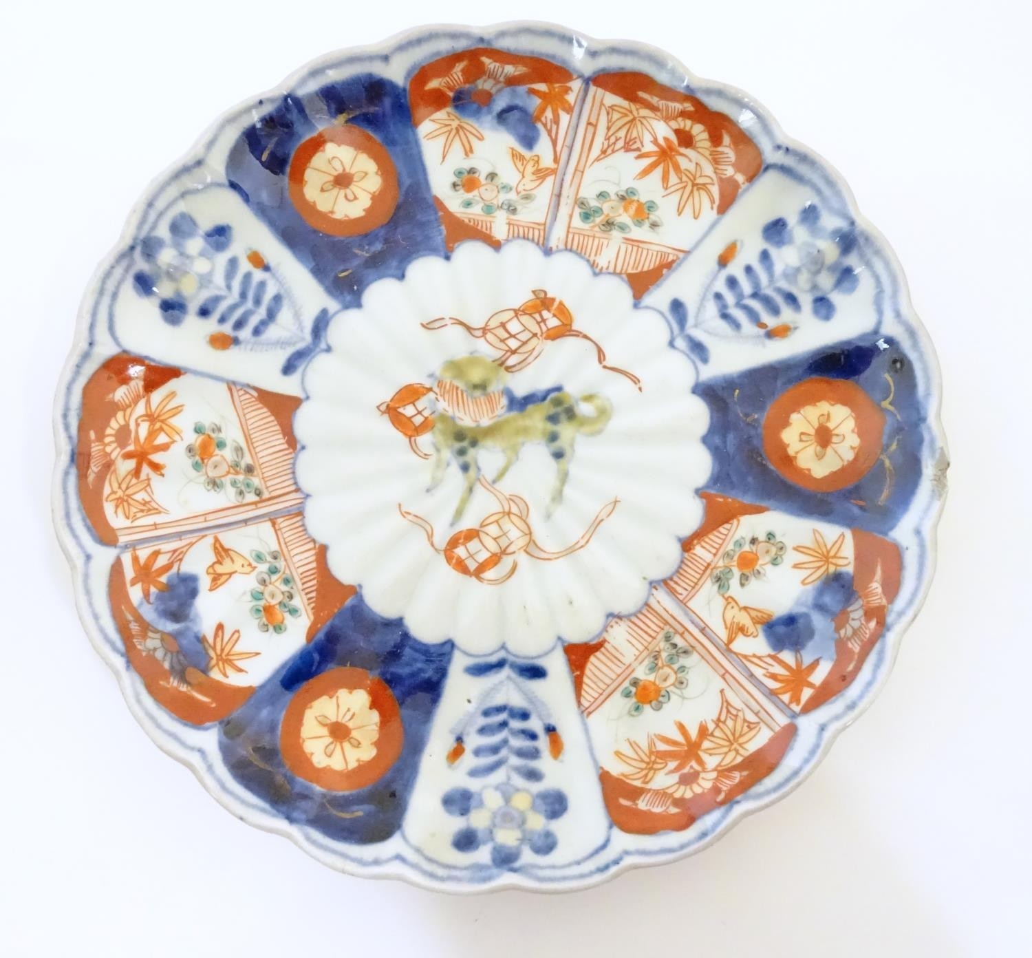 An Oriental plate in the Imari palette decorated with big cat / leopard / cheetah to centre and a - Image 7 of 8