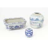 Three Oriental items to include a hand painted jar with brushwork detail, a blue and white