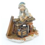 An Italian Capodimonte model of a Carpenter, and signed Milio. Marked under with pattern no. 162.