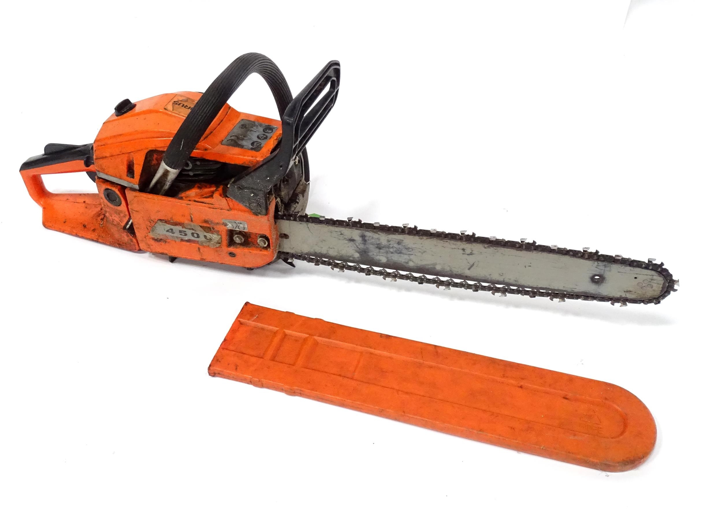 A Tarus 4500 petrol chainsaw, with blade guard, approx 34 1/4" long Please Note - we do not make