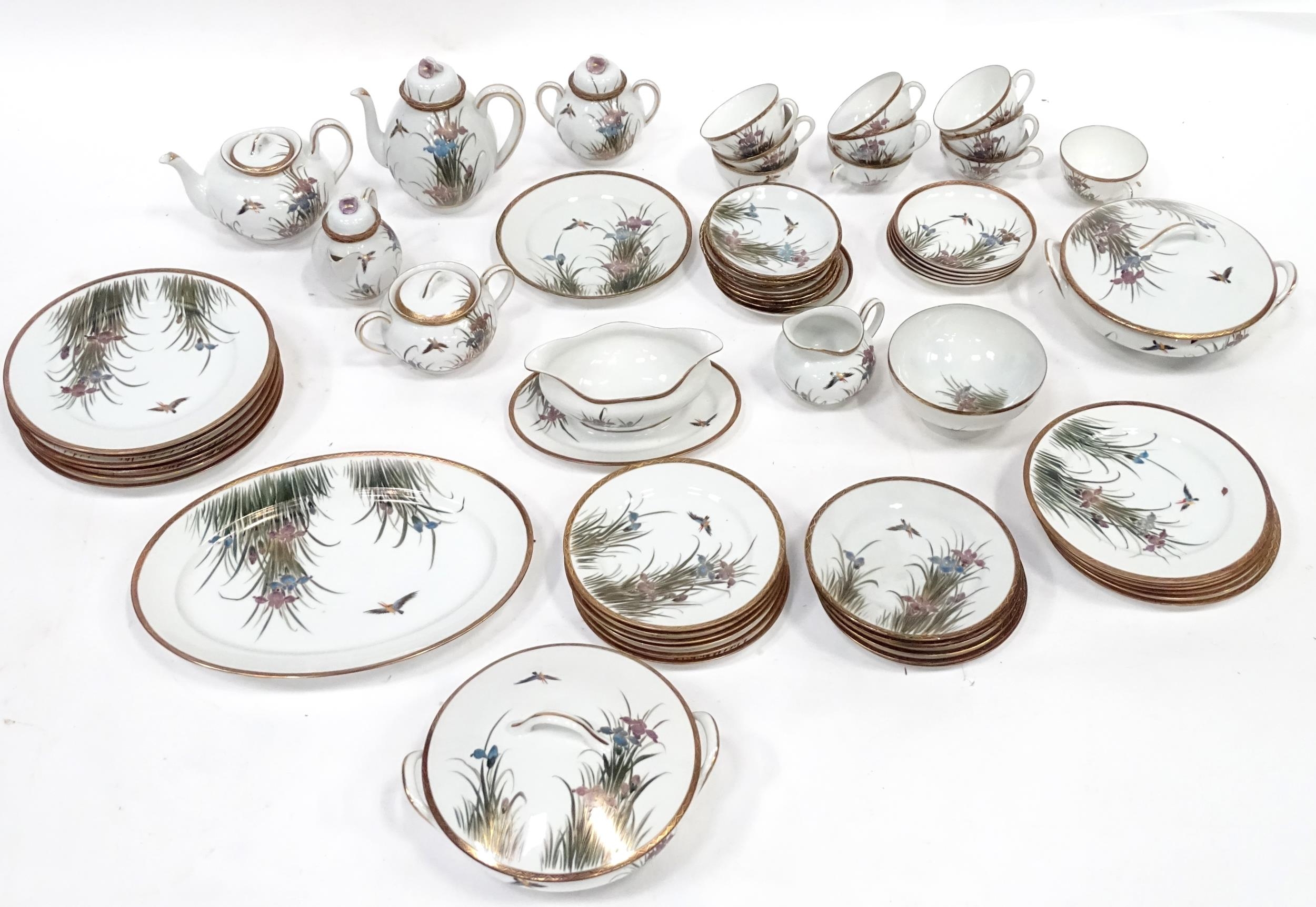 A quantity of Japanese tea / dinner wares decorated with birds and iris flowers, to include