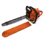 A Tarus 4500 petrol chainsaw, with blade guard, approx 34 1/2" long Please Note - we do not make