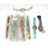 Wristwatches : A quantity of assorted Swatch watches, together with an example by Minitz, etc.