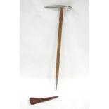 A mid 20thC mountaineer's ice axe (combination pickaxe and walking stick), the blade stamped '2 -