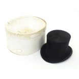 Vintage fashion / clothing: A Morgan & Ball top hat with hat box with Harrods label to the top. Head