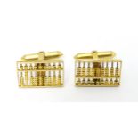 A pair of 14ct gold cufflinks with abacus detail Please Note - we do not make reference to the