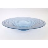 A pale blue glass bowl with swirl detail. Approx 19" diameter Please Note - we do not make reference