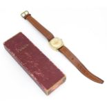 A Tudor (Rolex) 9ct gold cased wristwatch, hallmarked Birmingham 1951, maker Dennison Watch Case Co.