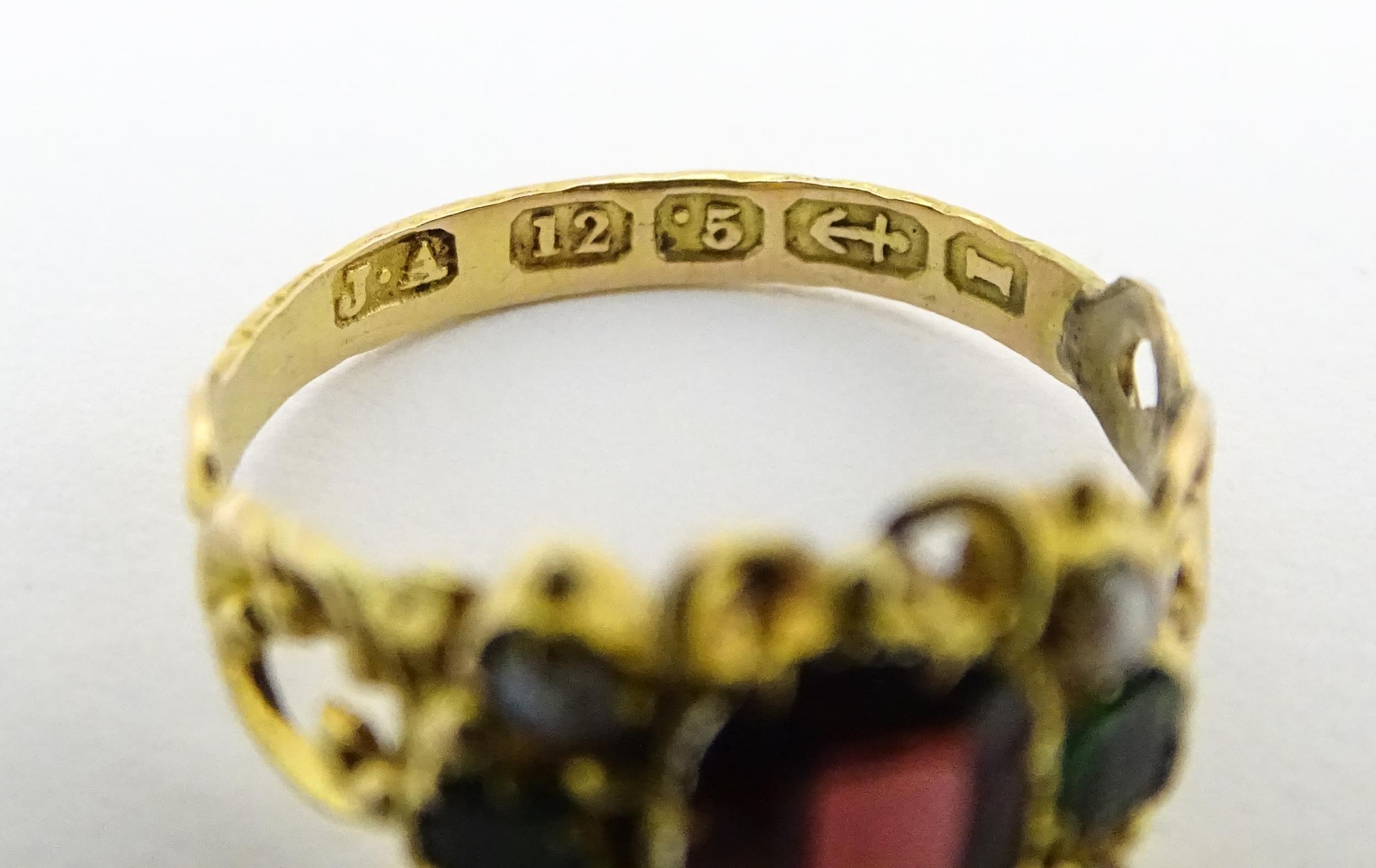 A Victorian 12ct gold ring set with garnet and pearl hallmarked Birmingham 1857. Maker J.A Ring size - Image 6 of 6
