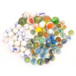Toys: A quantity of marbles, many with colours twists, etc. Largest approx. 1"