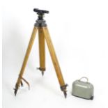 A cased mid 20thC Theodolite and tripod by Hall Bros, London, approx 62" tall (2) Please Note - we