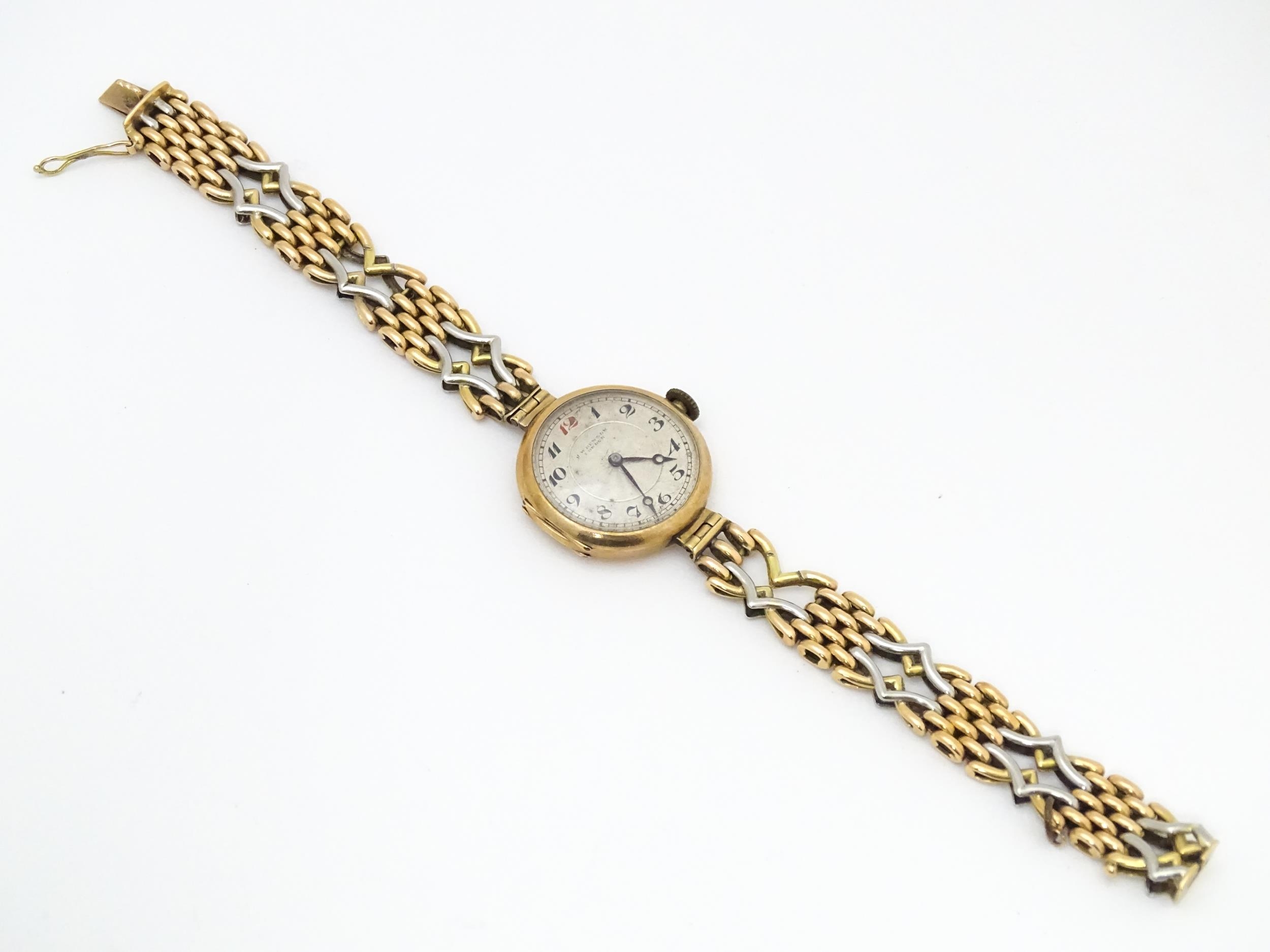 A c.1925 9ct gold cast ladies wristwatch, the dial with engraved decoration, Arabic numerals and - Image 3 of 11