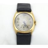 A 9ct gold cased wristwatch with Arabic numerals and subsidiary seconds dial at six. The watch