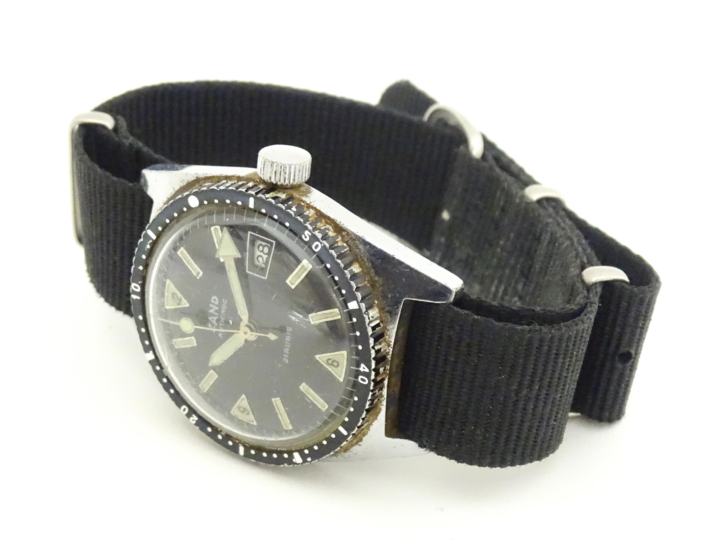 A 1960s steel cased mens divers style watch, the dial signed ' Zand ' , having 21 jewel manual