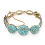 A white metal bracelet set with turquoise and seed pearl. Indistinctly marked. Possibly Russian.