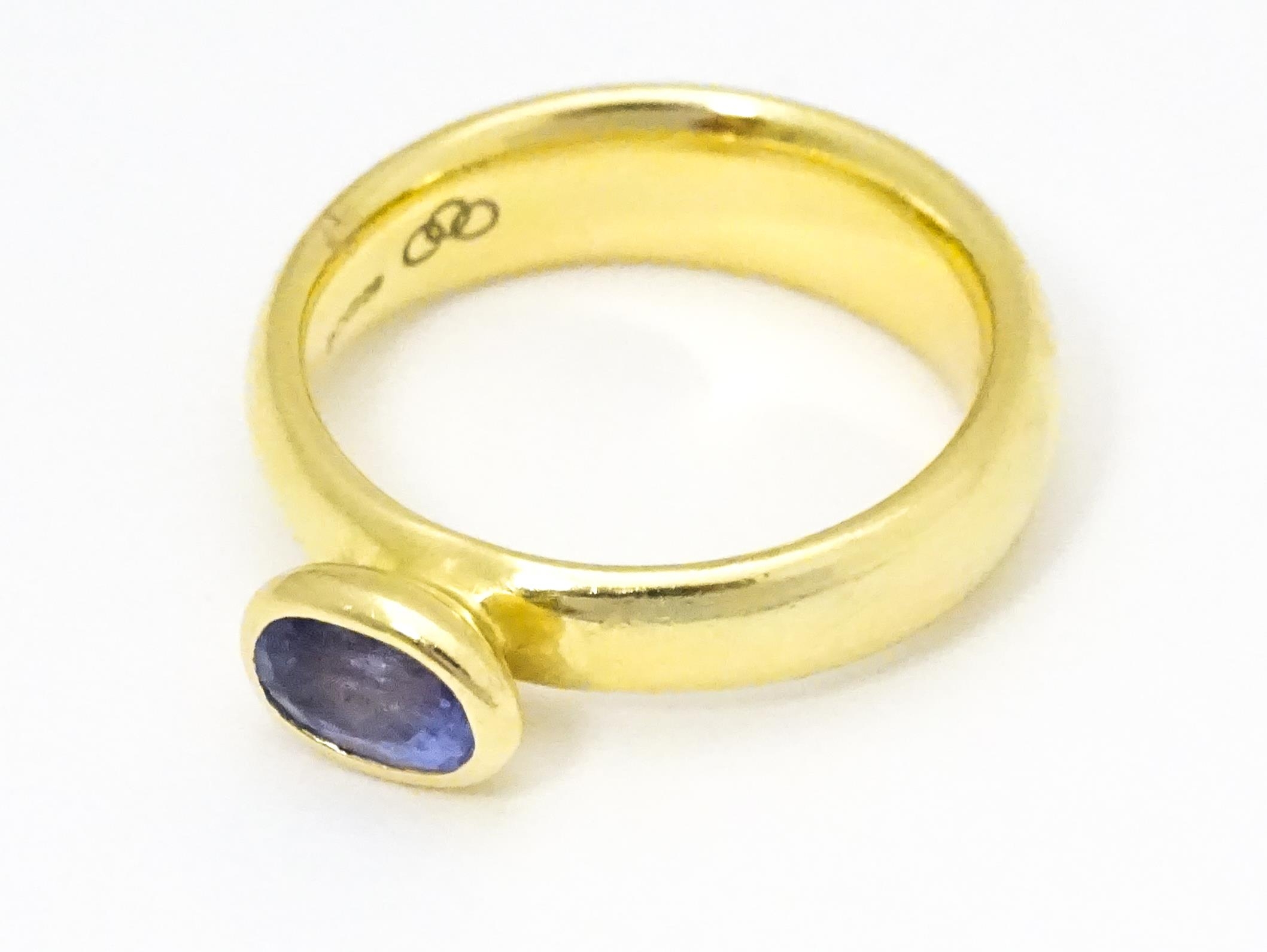 An 18ct gold ring set with oval tanzanite, maker Links of London. Ring size approx M Please Note - - Image 7 of 7