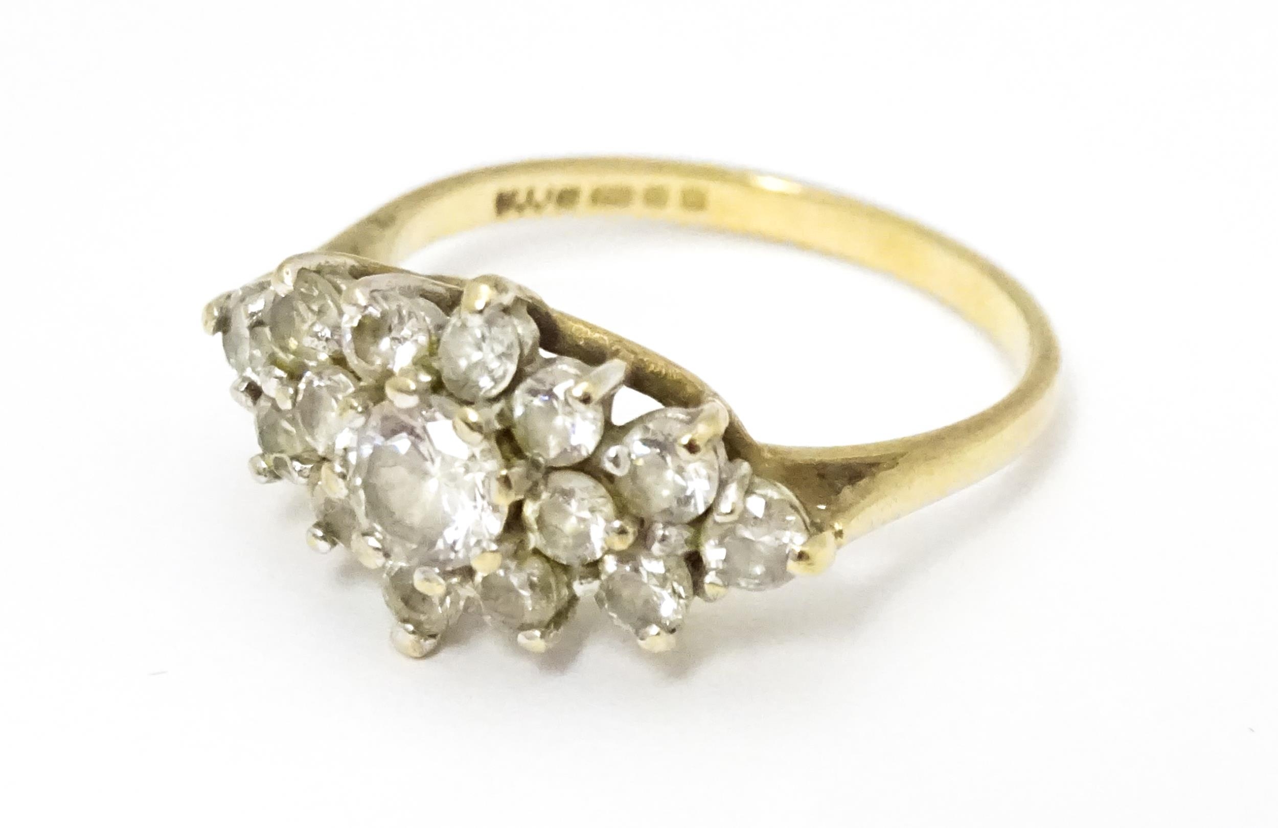 A 9ct gold ring set with cluster of white stones. Ring size approx. J 1/2 Please Note - we do not - Image 2 of 6