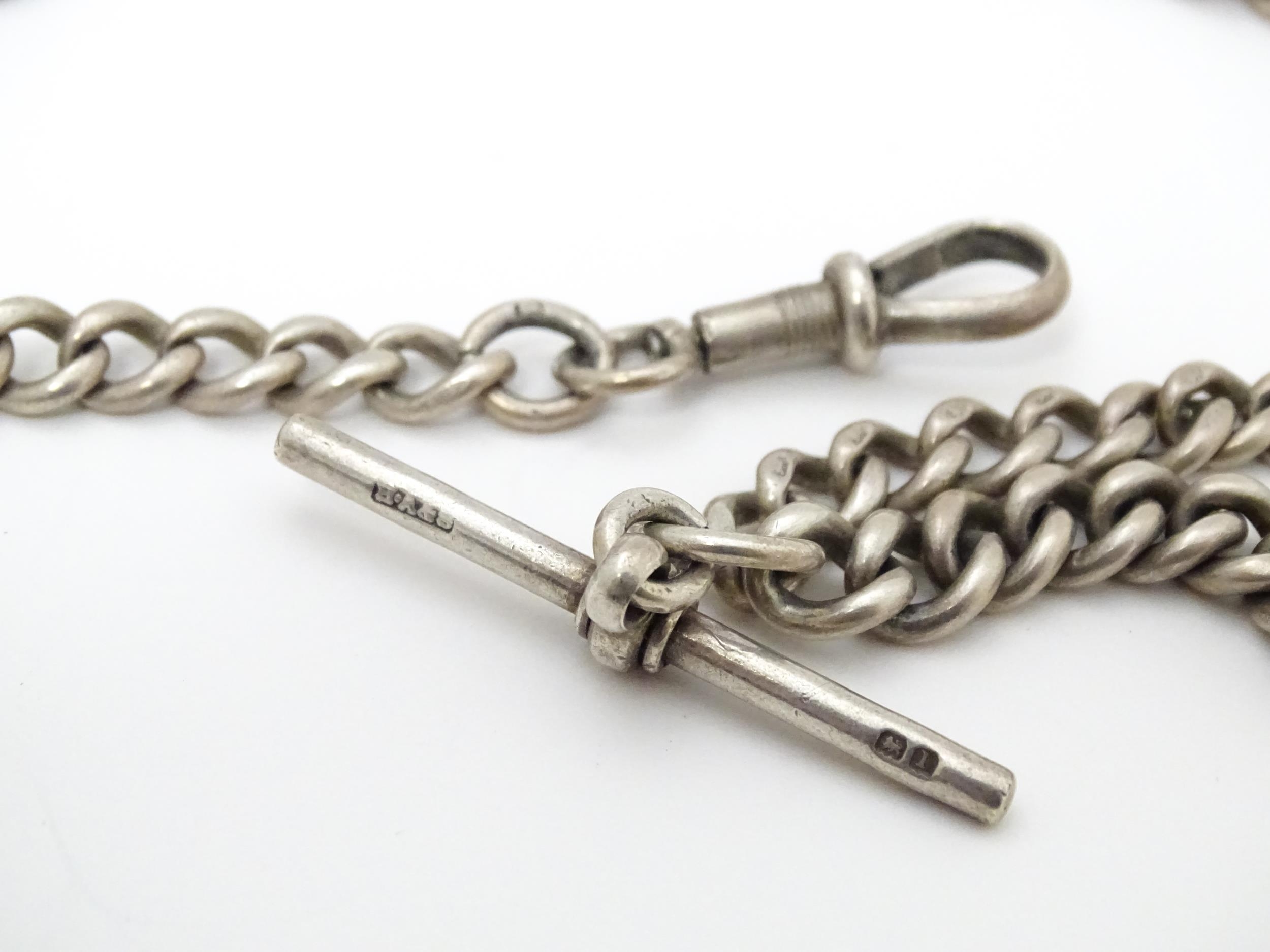 A silver pocket watch chain of graduated curblink form. Hallmarked Birmingham 1910. Approx 15" - Image 3 of 4