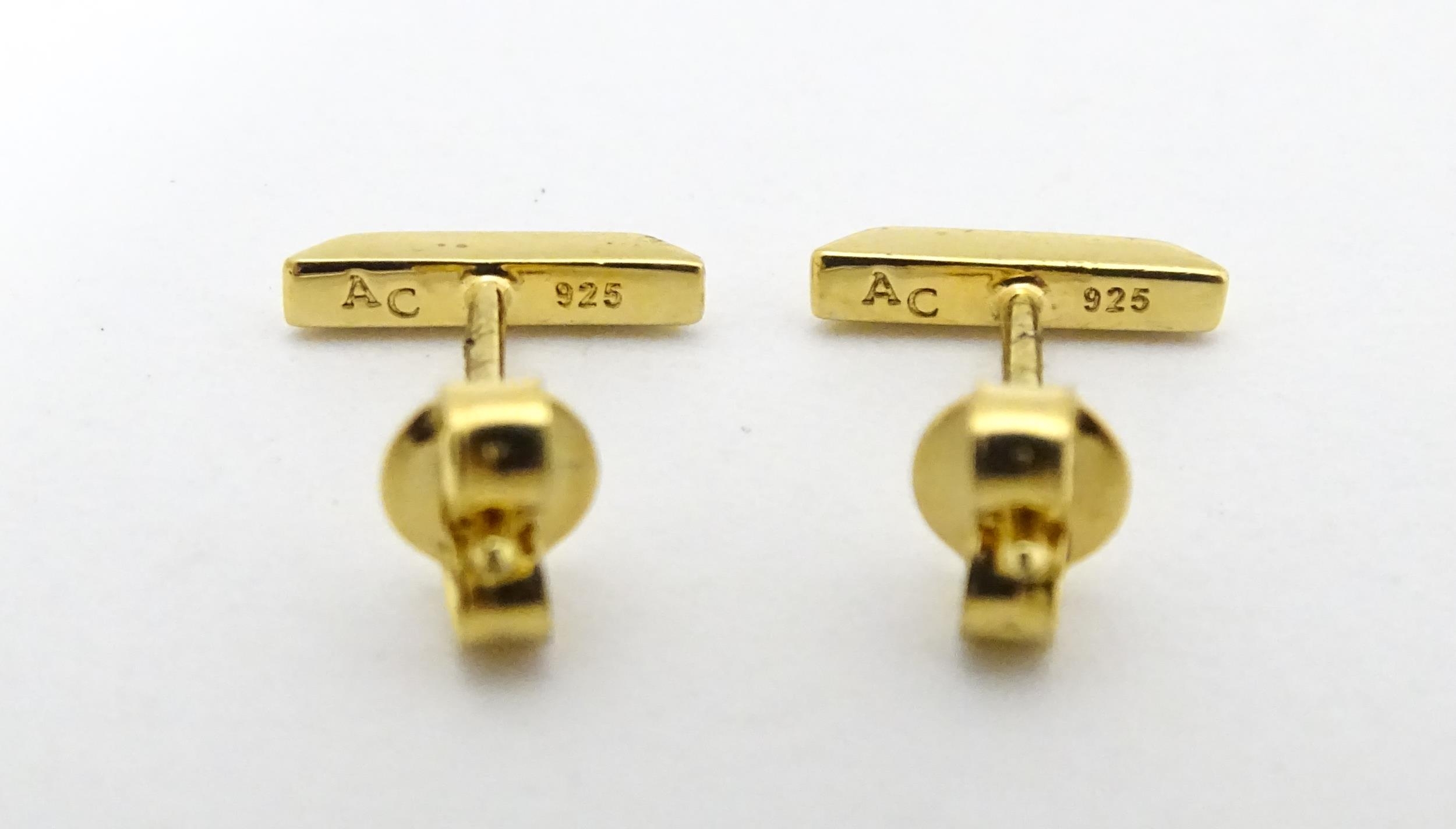A pair of Astley Clarke 925 silver gilt stud earrings with blue enamel detail. Approx. 1/4" wide - Image 7 of 8