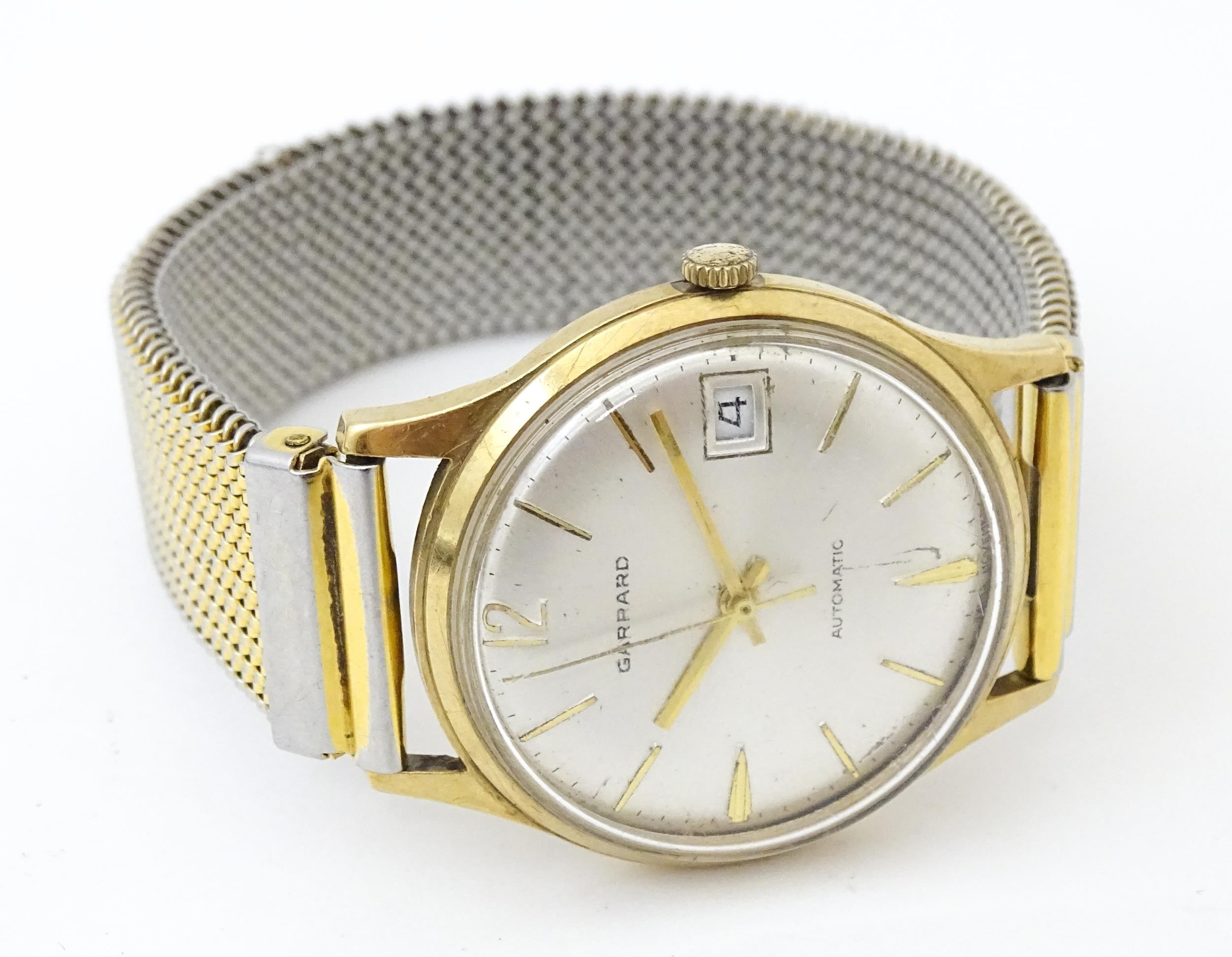 A 9ct gold cased Garrard Automatic wristwatch, the dial with date aperture at 3 . Approx 1 /4" - Image 3 of 5