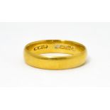 A 22ct gold wedding band. Hallmarked London 1915 maker W Wilkinson Ltd. Ring size approx. L Please