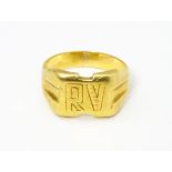 An 18ct gold signet ring. Ring size approx H Please Note - we do not make reference to the condition