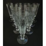 Ten Saint Louis crystal champagne flutes, marked under ' St Louis Cristal France' Approx 7 1/4" high