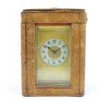 A brass French repeater carriage clock with Arabic numerals and signed ' Thos Elliott 50 West Strand