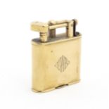 A Dunhill 9ct gold pocket lighter, stamped underside 'Dunhill Unique Lighter - Pat 143752' and