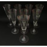 Salviati & Co. Glassware: Eight Venetian glass champagne flutes with pink detail to rims. Approx. 8"