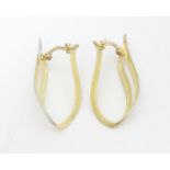 A pair of 9ct gold earrings with white gold detail Approx 1 1/4" long Please Note - we do not make