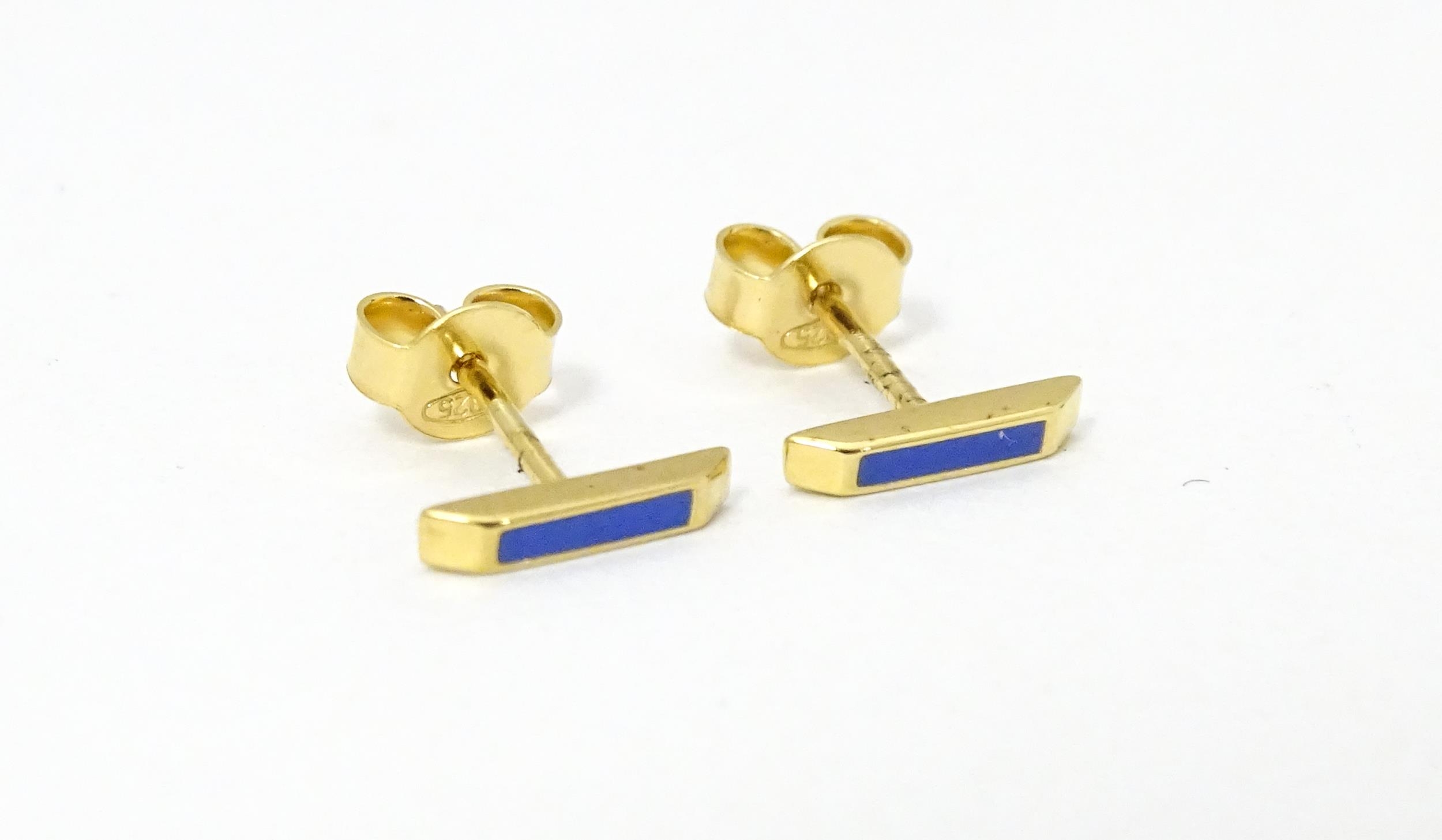 A pair of Astley Clarke 925 silver gilt stud earrings with blue enamel detail. Approx. 1/4" wide - Image 5 of 8