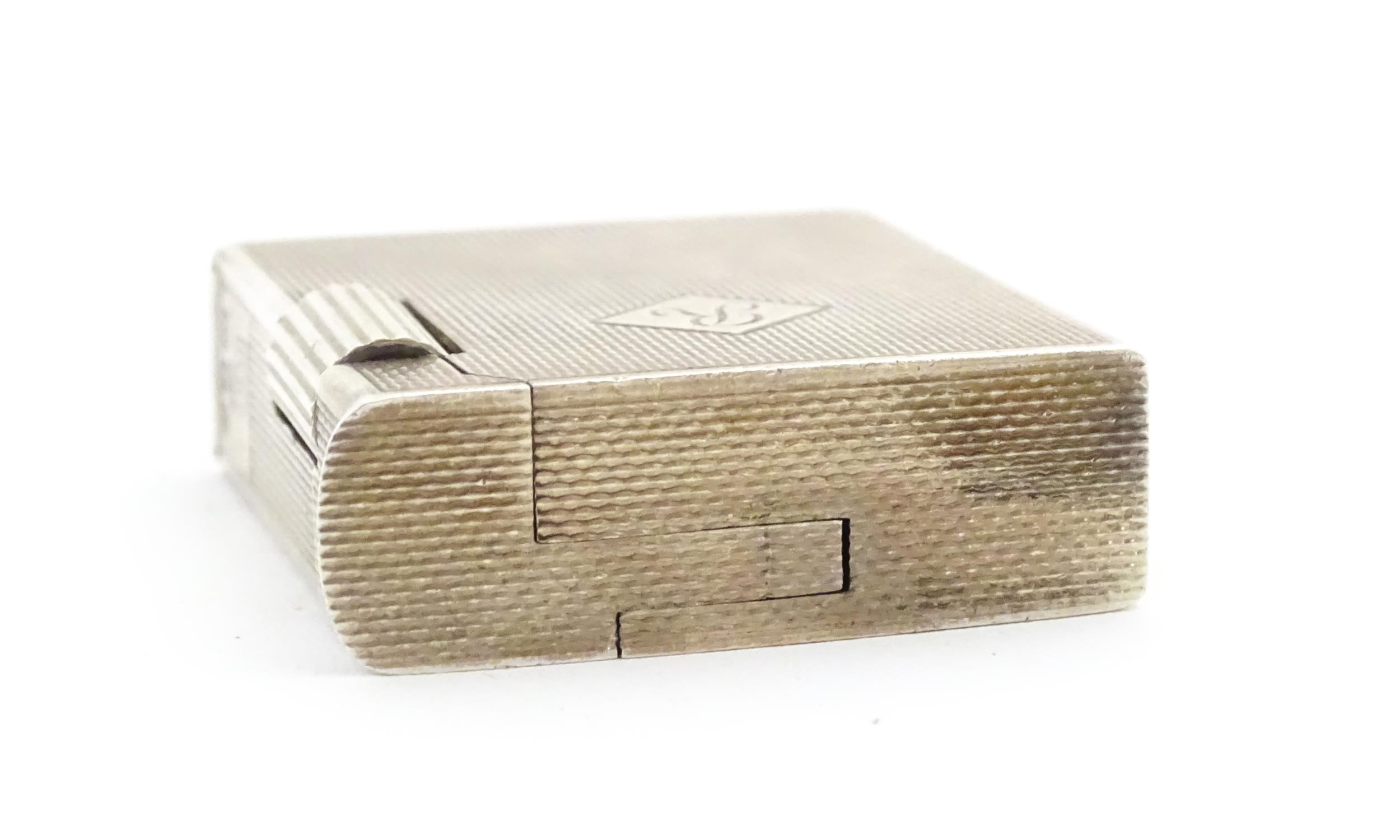 A cased Art Deco style silver pocket lighter with engine turned decoration, hallmarked 1950 London - Image 9 of 11