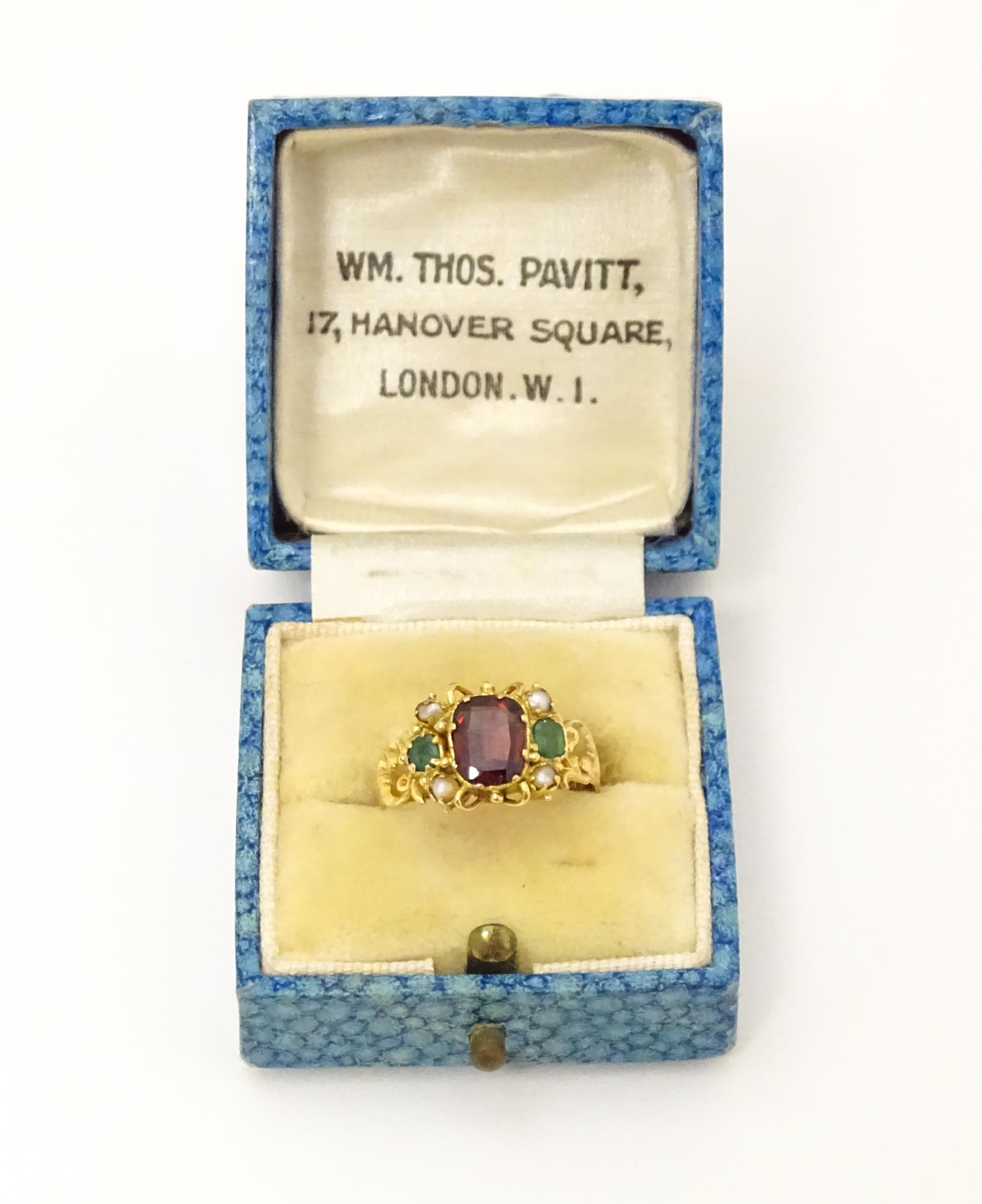 A Victorian 12ct gold ring set with garnet and pearl hallmarked Birmingham 1857. Maker J.A Ring size - Image 2 of 6