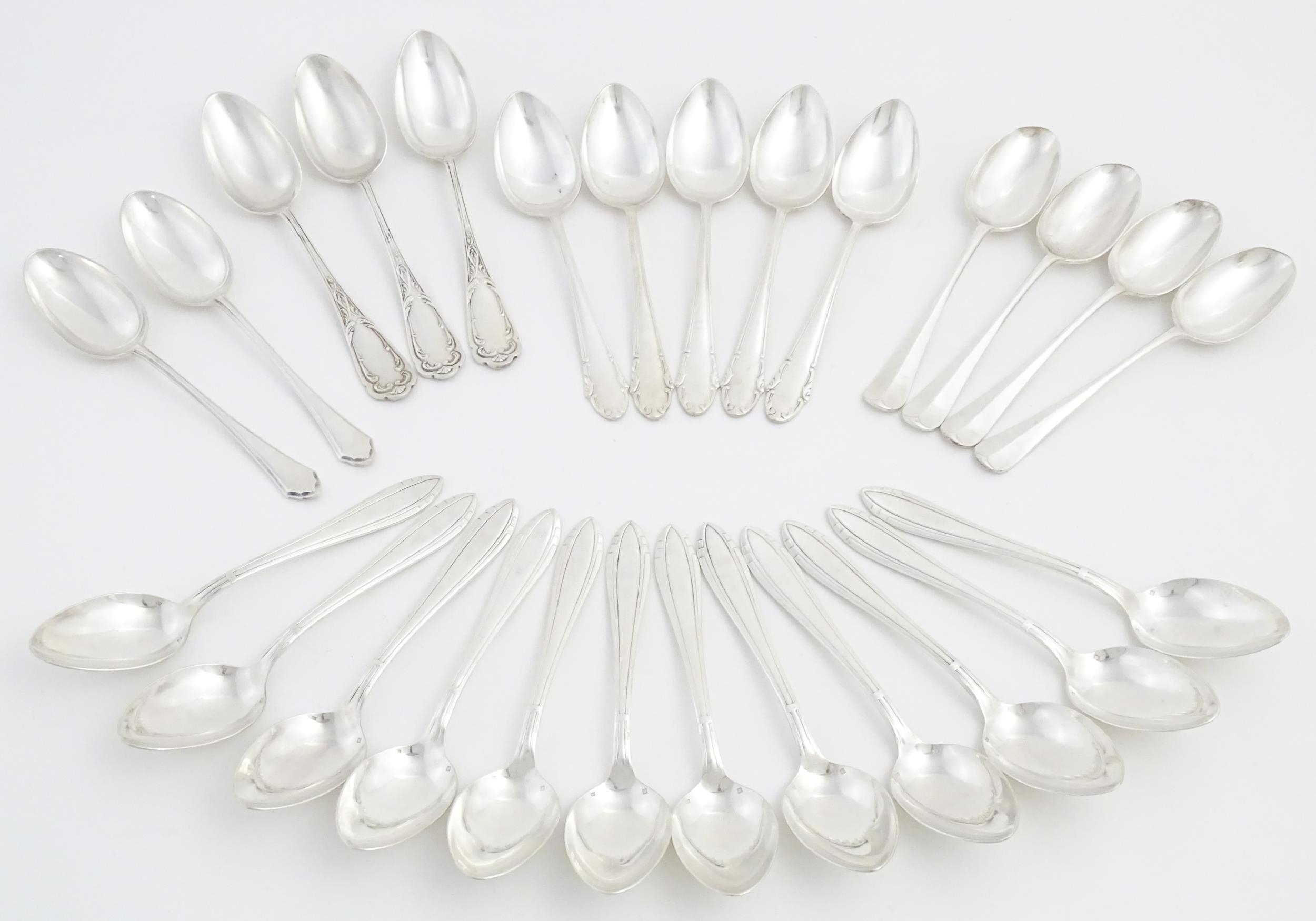 A quantity of assorted silver plate cutlery / flatware to include assorted spoons, serving spoons,